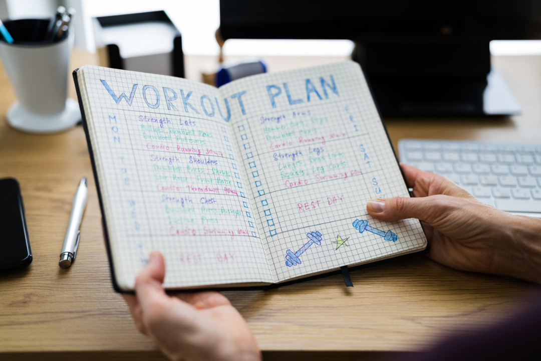 a close up of a workout diary 